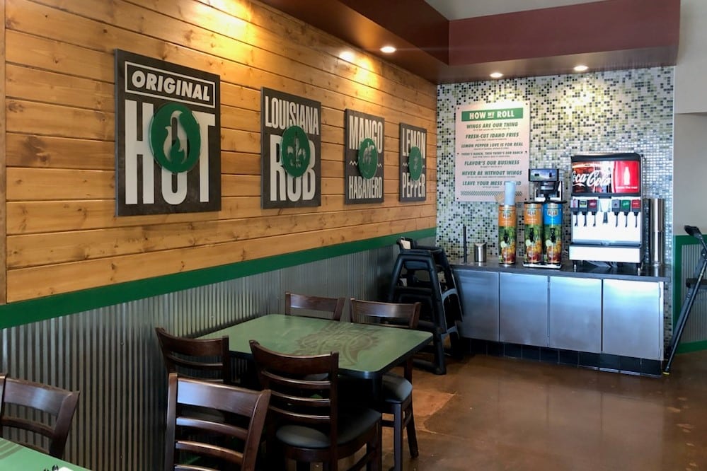 wingstop interior seating and drink station